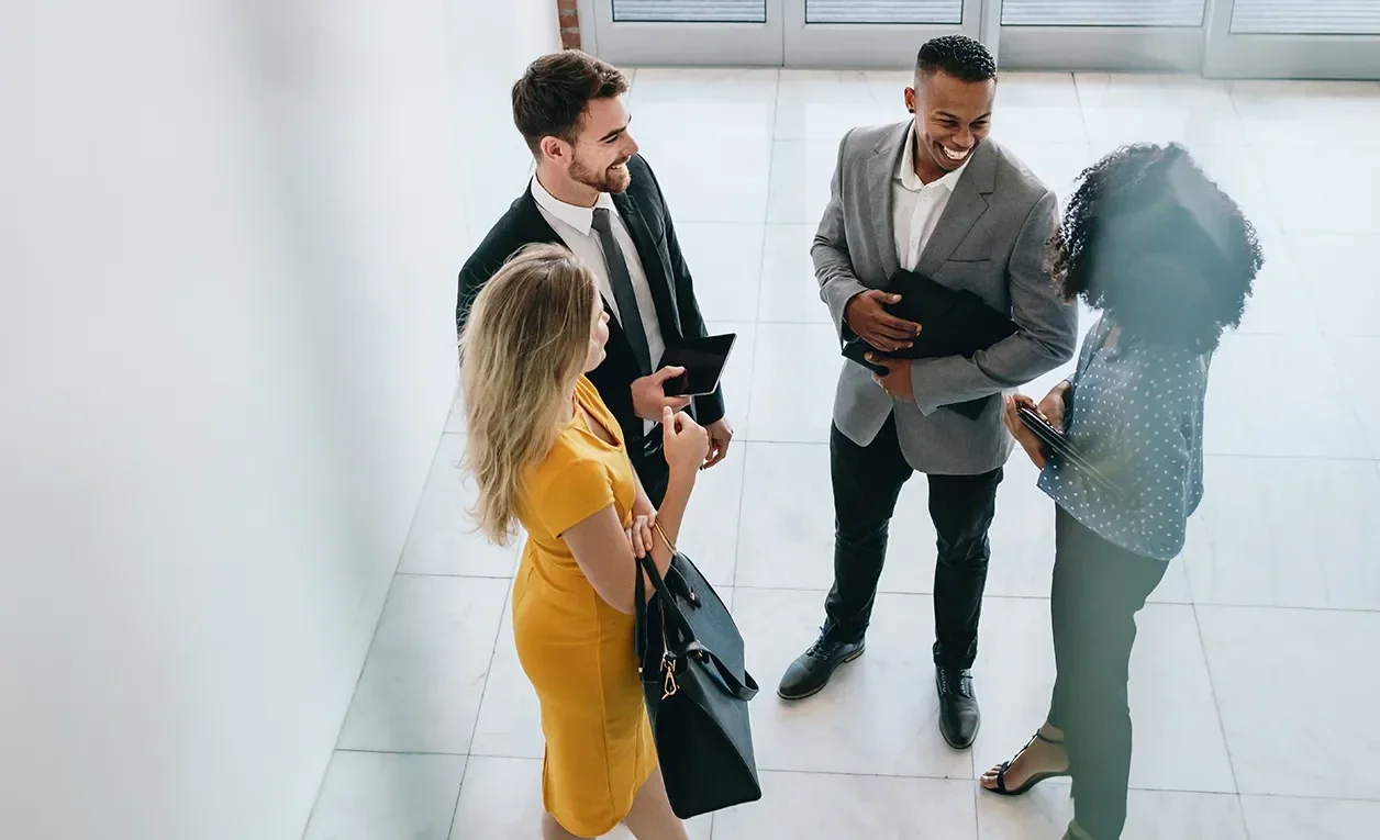 Employees standing in circle